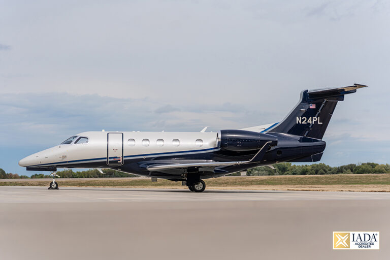 Phenom 300E - N24PL-1 IADA logo